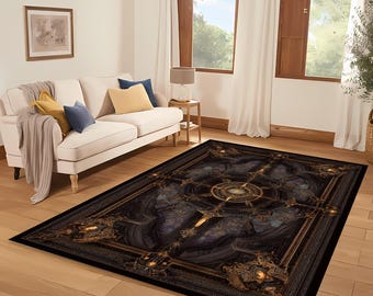 May include: A rectangular area rug with a dark, ornate design. The rug features a black background with gold and bronze accents, creating a detailed, almost celestial pattern. The rug is placed on a hardwood floor in a living room setting.