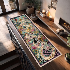 May include: A long, rectangular rug with a whimsical Alice in Wonderland design. The rug features a light blue background with illustrations of clocks, teacups, and characters from the story. The border is a dark purple, and the rug is placed on a wooden floor.