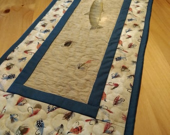 Quilted table runner with fishing lures