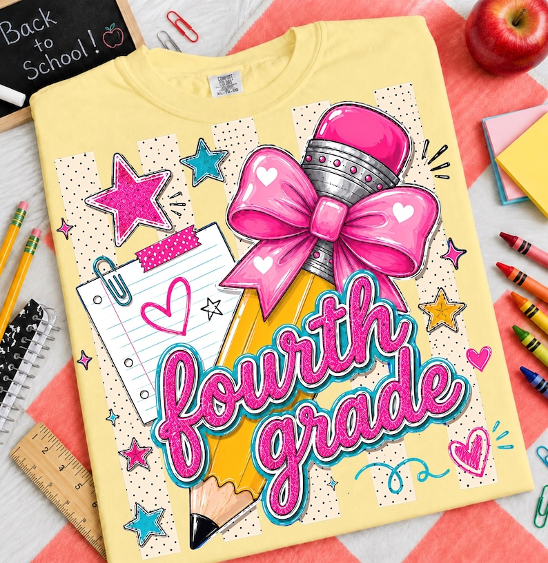 May include: A pale yellow t-shirt featuring a graphic of a yellow pencil with a large pink bow, a piece of lined notebook paper, and the text "fourth grade" in pink script. The design includes pink and teal stars and small hearts.