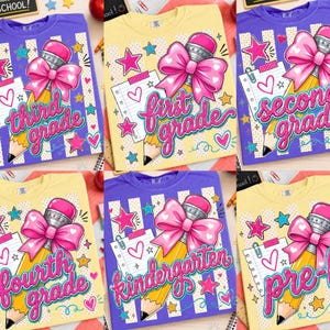 May include: A collection of six t-shirts in yellow and purple, each featuring a graphic of a yellow pencil with a pink bow, a notepad with a heart, and colourful stars. The shirts display the text third grade, first grade, second grade, fourth grade, kindergarten, and pre-k.