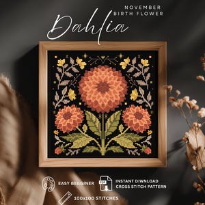Pode incluir: Um padrão de ponto cruz emoldurado com um design de flor de Dália. A obra de arte apresenta uma flor laranja com folhas verdes e detalhes amarelos sobre um fundo preto. A moldura é de madeira clara. O texto inclui "Dália", "Flor de nascimento de novembro" e "Fácil para iniciantes".