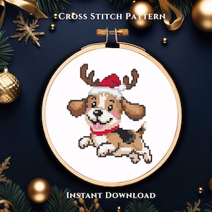 May include: A cross-stitch pattern featuring a cartoon dog wearing a Santa hat and reindeer antlers. The dog is brown, white, and black, with a red collar. The text "Cross Stitch Pattern" and "Instant Download" are visible.