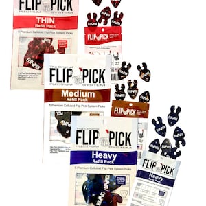 May include: Three packs of The Original Flip Pick Plectrum System in thin, medium, and heavy gauges, each containing five premium celluloid picks. The packaging features red, brown, and blue color coding with the Flip Pick logo and text.