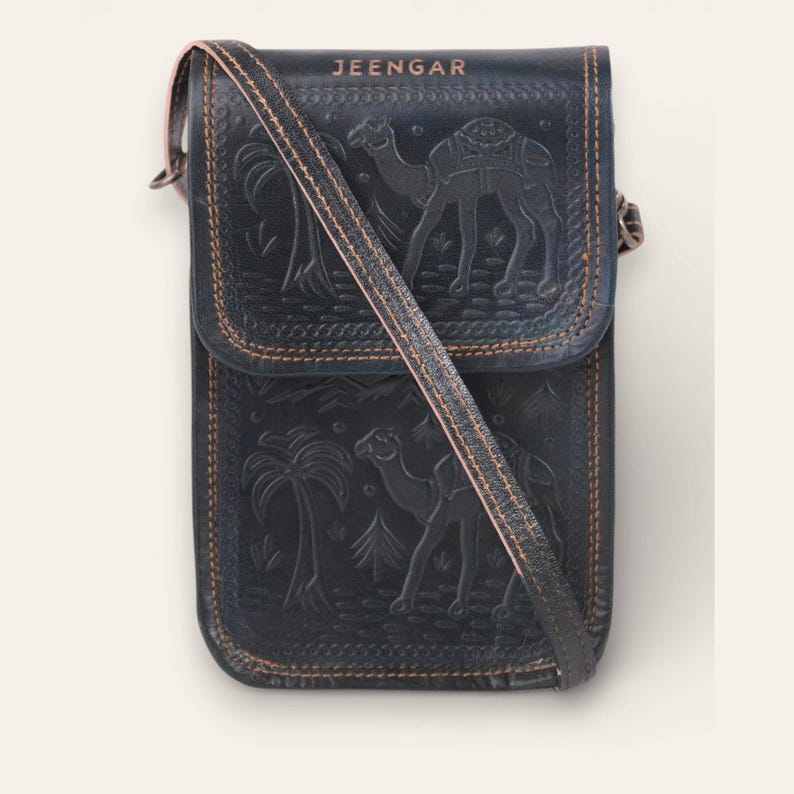 The Nagaur Sling in Dark Olive, hand-embossed leather mobile sling, front view