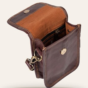 The Nagaur Kashidakari Sling opened, showing the velvet-lined interior and zip pocket