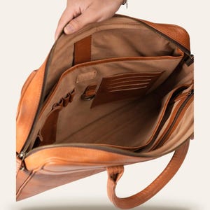 The Sonar Briefcase, open interior with velvet lining, card slots and pen loops
