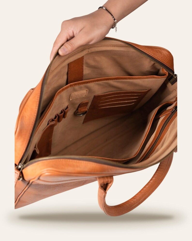 The Sonar Briefcase, open interior with velvet lining, card slots and pen loops