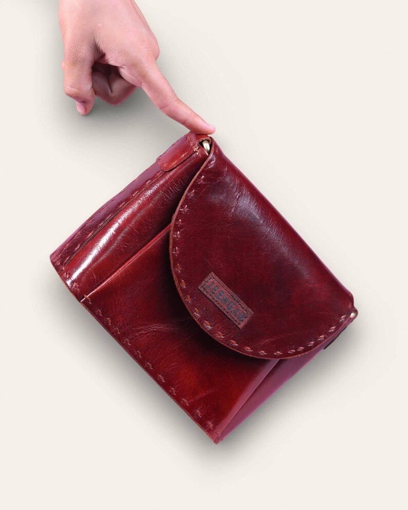 The Beawar Sling in Cherry, full-grain leather crossbody bag