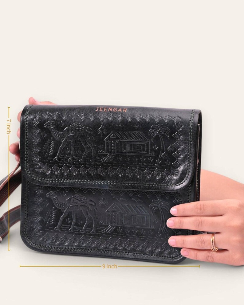 The Pushkar Sling in Dark Olive, embossed camel and desert dwelling motif