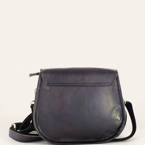 The Marwari Sling in Black, back view with the adjustable strap