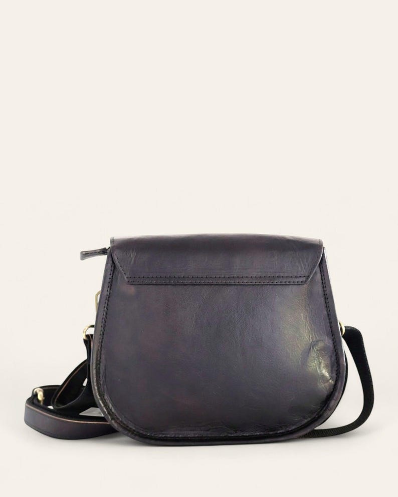 The Marwari Sling in Black, back view with the adjustable strap