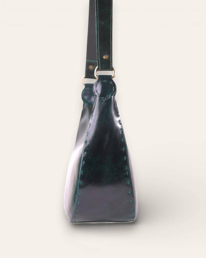 The Ranisar Shoulder Bag in Dark Olive, hand-stitching detail