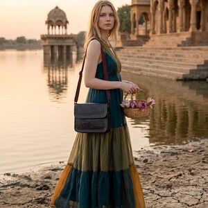 The Pushkar Sling in Dark Olive, hand-embossed real leather sling bag by Jeengar