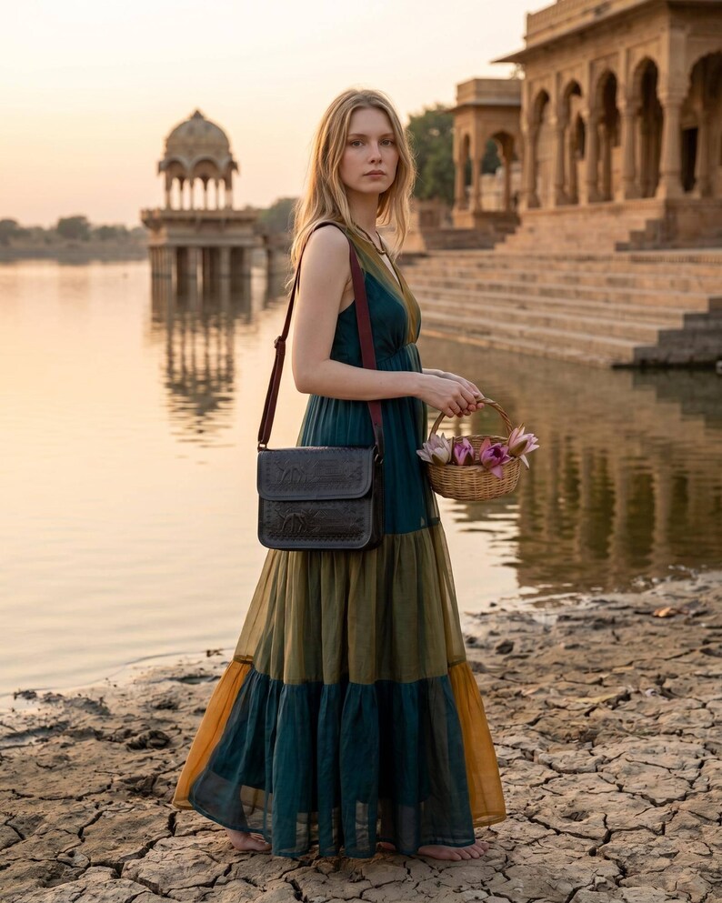 The Pushkar Sling in Dark Olive, hand-embossed real leather sling bag by Jeengar