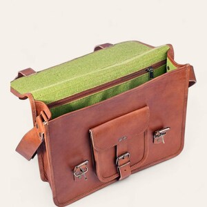 The Mewad Messenger open, revealing its bright-green canvas interior