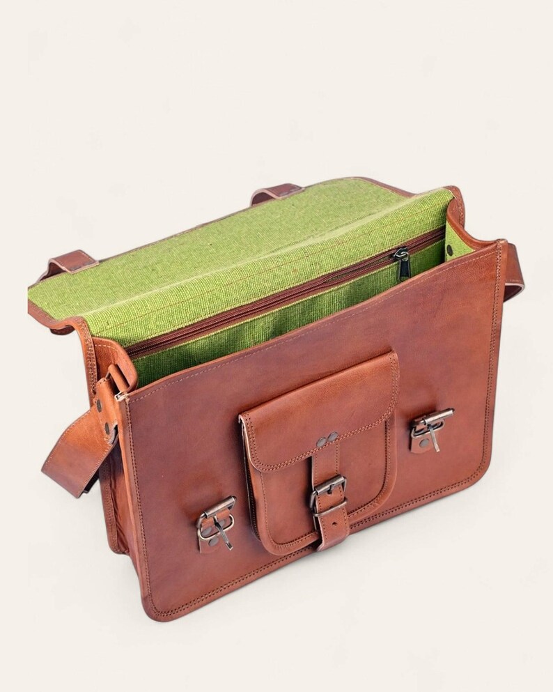 The Mewad Messenger open, revealing its bright-green canvas interior