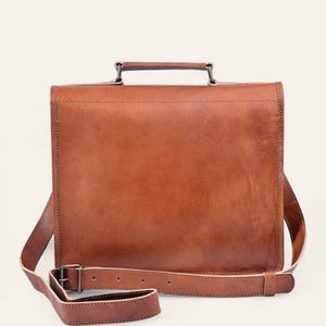 The Malani Messenger, side view showing the slim profile and adjustable strap