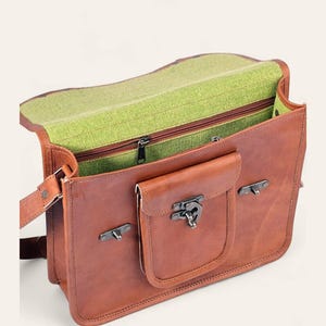 The Malani Messenger, open, showing the green canvas-lined interior