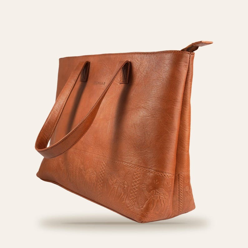 Three-quarter view of The Abhaneri Tote showing its depth and shoulder-drop handles