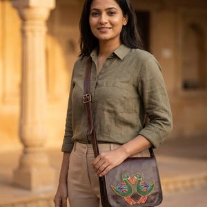 The Moruda Sling worn cross-body in warm afternoon light against Rajasthani sandstone (AI-generated)