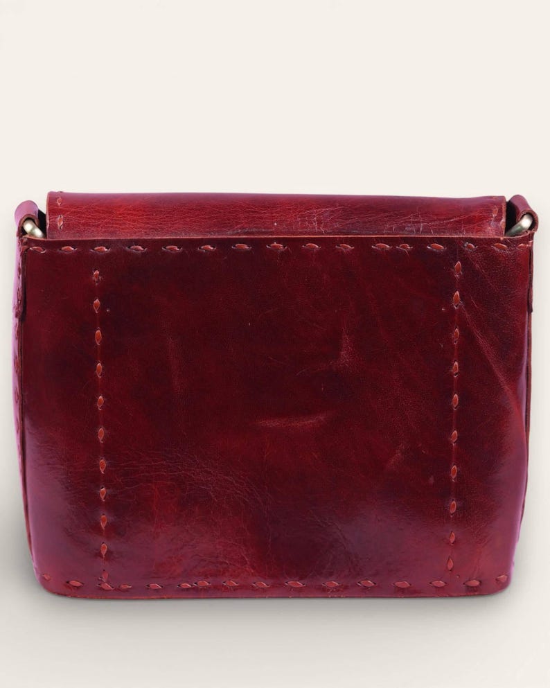The Beawar Sling in Cherry, prominent saddle-stitch detail