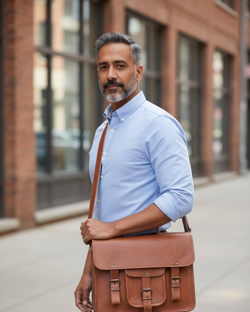 Man wearing The Mewad Messenger cross-body on a city street (AI-generated)