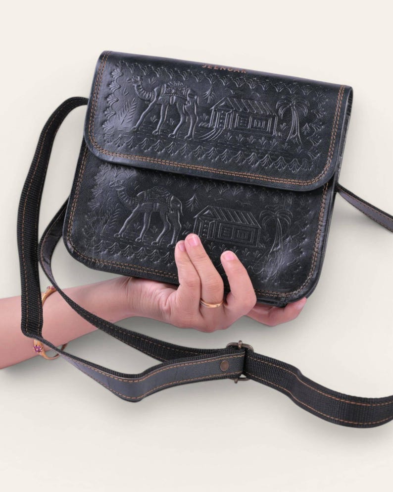 The Pushkar Sling in Dark Olive, embossed desert scene