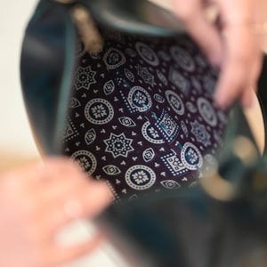 The Ranisar Shoulder Bag in Dark Olive, spacious leather shoulder bag by Jeengar