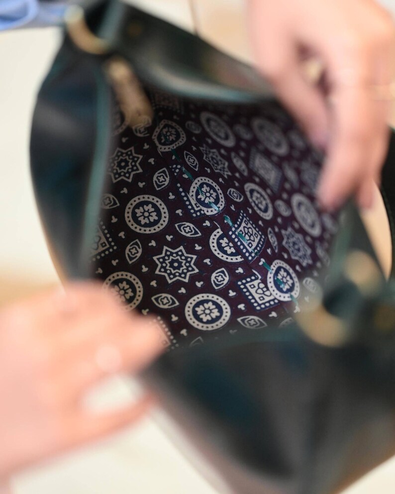 The Ranisar Shoulder Bag in Dark Olive, spacious leather shoulder bag by Jeengar