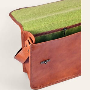 The Jodhpur Messenger open, revealing its bright-green canvas interior