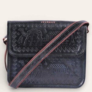 The Pushkar Sling in Dark Olive, a modern heirloom sling bag