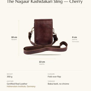 Specification card for The Nagaur Kashidakari Sling (Cherry): 13 cm wide, 18 cm high, full-grain leather, babul bark tannage. Made by Ratan Ji.