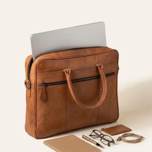 The Sonar Briefcase, a 16 in laptop and daily work essentials at the open zip top