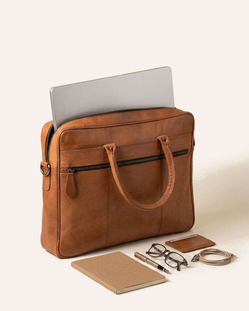 The Sonar Briefcase, a 16 in laptop and daily work essentials at the open zip top