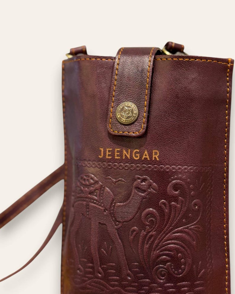 The Osian Mobile Sling, cherry red leather mobile sling, detail