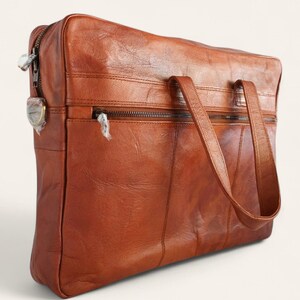 The Mehrangarh Briefcase three-quarter view showing the leather grain