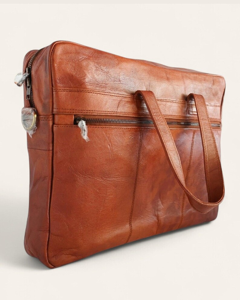 The Mehrangarh Briefcase three-quarter view showing the leather grain