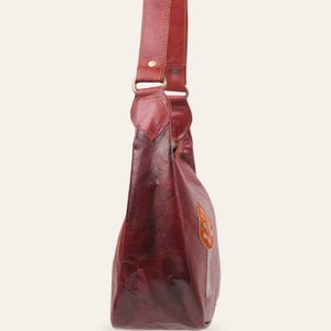 The Kashida Shoulder Bag, Cherry side profile
