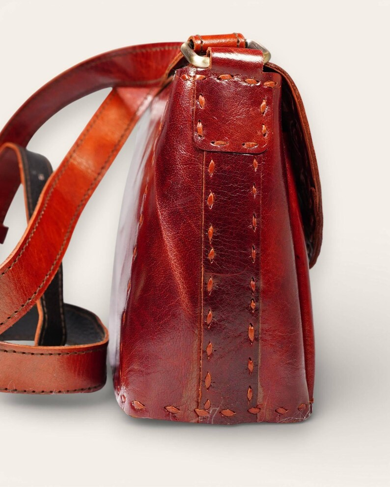 The Beawar Sling in Cherry, handcrafted leather sling by artisan Manish