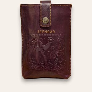 The Osian Mobile Sling, embossed desert art on full-grain leather