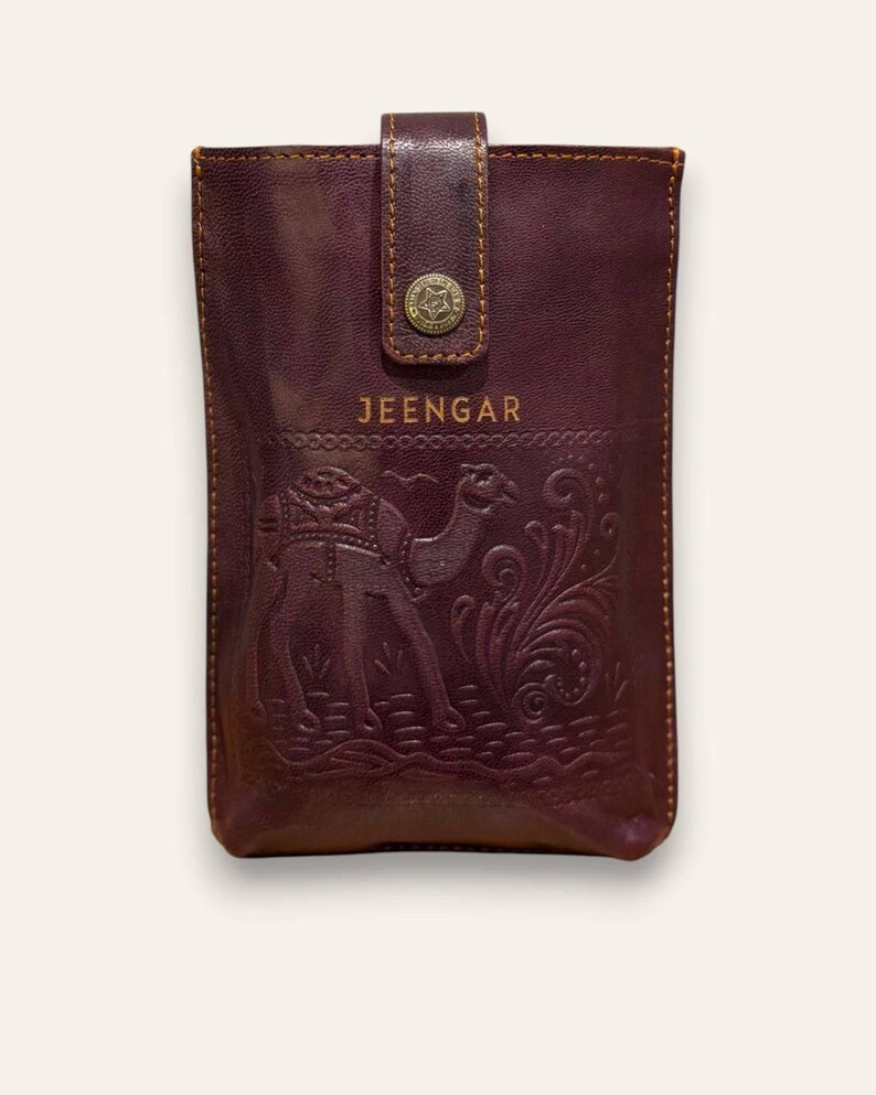 The Osian Mobile Sling, embossed desert art on full-grain leather