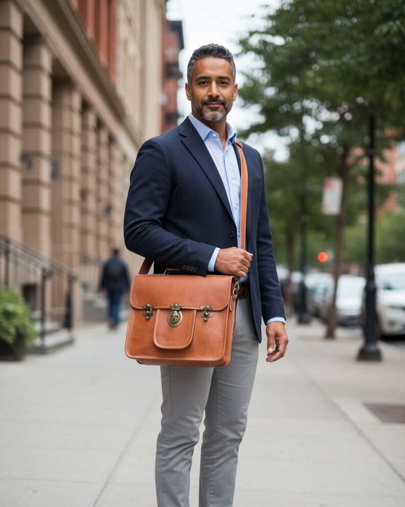 A man wearing The Malani Messenger crossbody, natural-brown leather messenger (AI-generated)