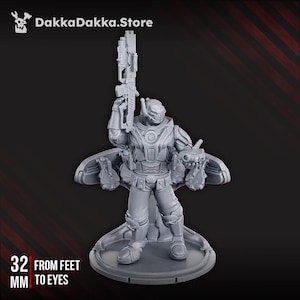 May include: A gray, 3D-printed miniature of a futuristic soldier holding a large gun. The figure is wearing detailed armor and a helmet. The text "32 MM FROM FEET TO EYES" is visible. The DakkaDakka.Store logo is in the top left corner.