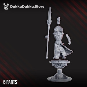 May include: A disassembled gray figurine of a futuristic warrior, featuring a spear, helmet, torso, arm, and base. The figurine is composed of six parts and is set against a dark background. The store logo "DakkaDakka.Store" is in the top left corner.
