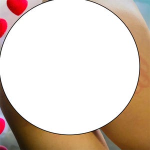 May include: A close-up shot of a person's arm and leg, with a large white circle obscuring the center. Red heart-shaped decorations are visible in the background, suggesting a romantic or Valentine's Day theme.