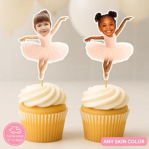 May include: Two cupcakes topped with white frosting and ballerina-themed toppers. The toppers feature images of young girls in pink tutus. The image also includes text that reads "Turnaround in 1-2 days" and "ANY SKIN COLOR".