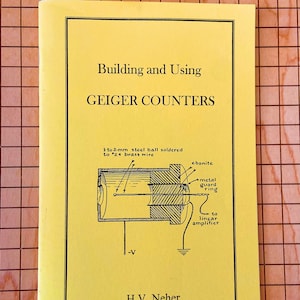 May include: A yellow pamphlet titled "Building and Using GEIGER COUNTERS" with a diagram of a Geiger counter and the text "H.V. Neher 1938".