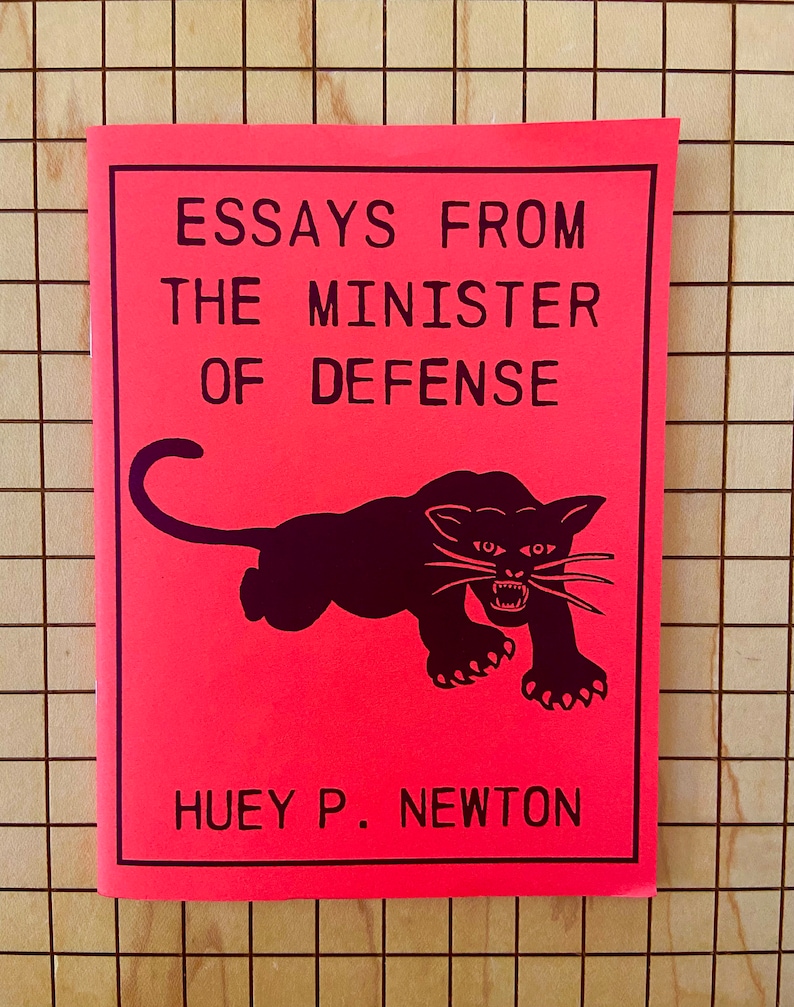 May include: A red pamphlet with the title "Essays From The Minister Of Defense" and a black panther illustration. The author is Huey P. Newton.