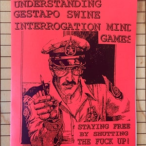 May include: A red pamphlet with black text titled "Anarchist Survival Guide for Understanding Gestapo Swine Interrogation Mini Games." The cover features a black and white illustration of a police officer with a stern expression, pointing a finger at the viewer. The text "Staying Free By Shutting The Fuck Up!" is printed below the illustration. The pamphlet is attributed to "Anarchist Author, Poet, Jailhouse Lawyer & Prisoner Harold H. Thompson."